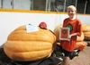 My 489.5 lbs. pumpkin with the Howard Dill Best Looking Award