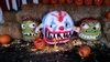 killer clown carves little pumpkins